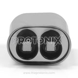 Close-up of capacitor for microwave oven showing connection terminals