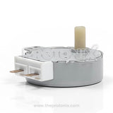 Close-up of SM-16T turntable motor for microwave oven showing terminals