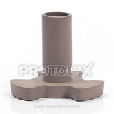 Close-up of Universal turntable coupler for microwave oven showing center hole and grip arms