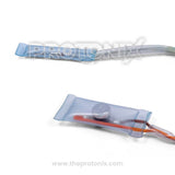 Close-up of temperature sensor with bimetal fuse for Godrej refrigerator showing sensor tip and wiring with cover