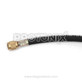 Close-up of black refrigerant charging hose threaded brass fitting