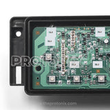Close-up of Panasonic top-load 10-button PCB partial shot showing capacitors and microchip area