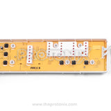 Whirlpool top-load 123 6-button PCB (M1 Memory) front view showing push buttons, connector ports, and ribbon cable joint