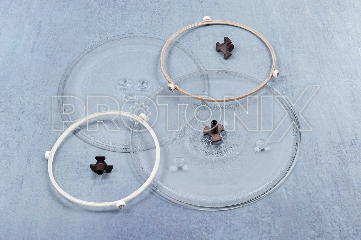 Collection of glass tray plates, turntable support rings and couplers for microwave ovens