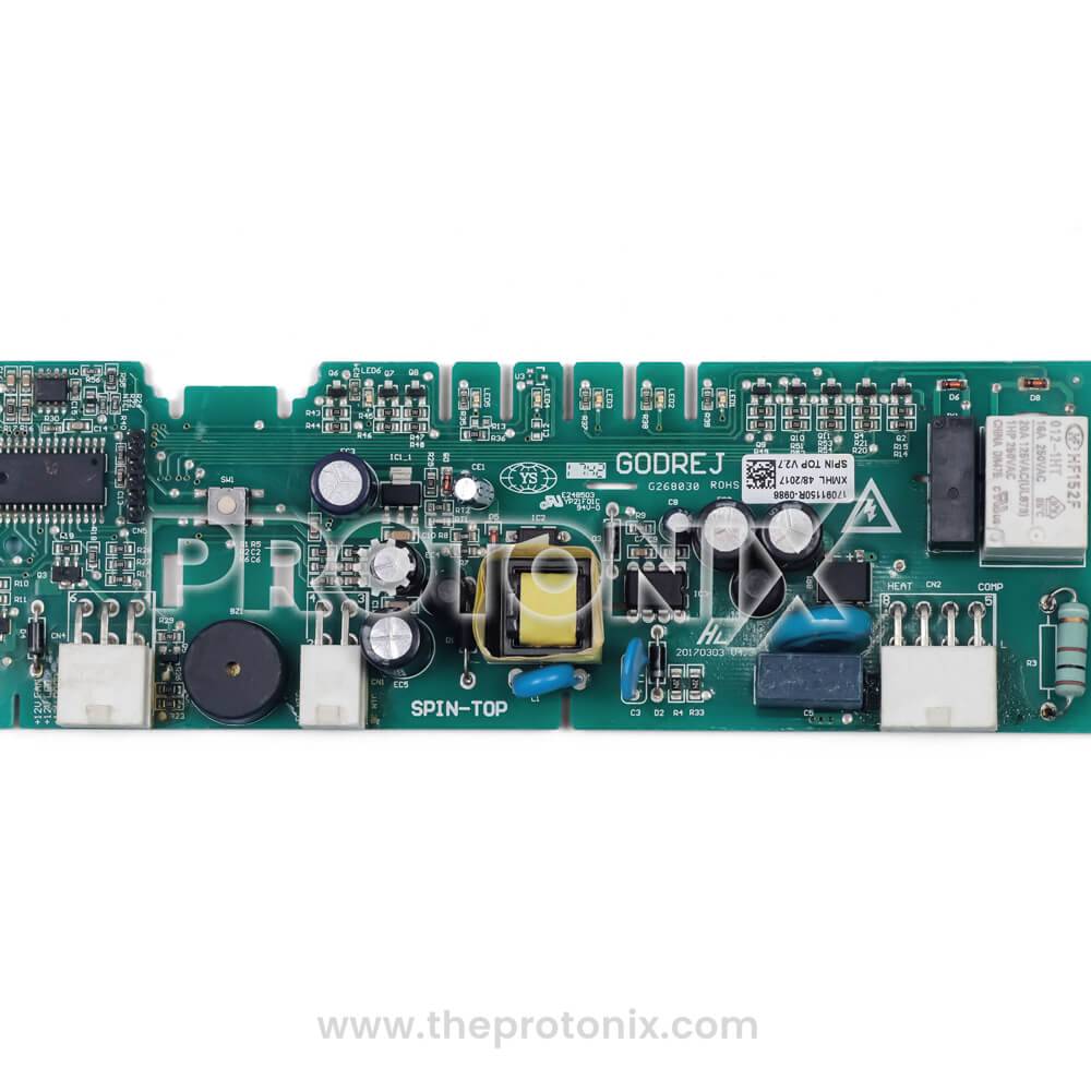 Half close-up of highlighting capacitors, relays, and connectors used in PCB for Godrej double-door refrigerator