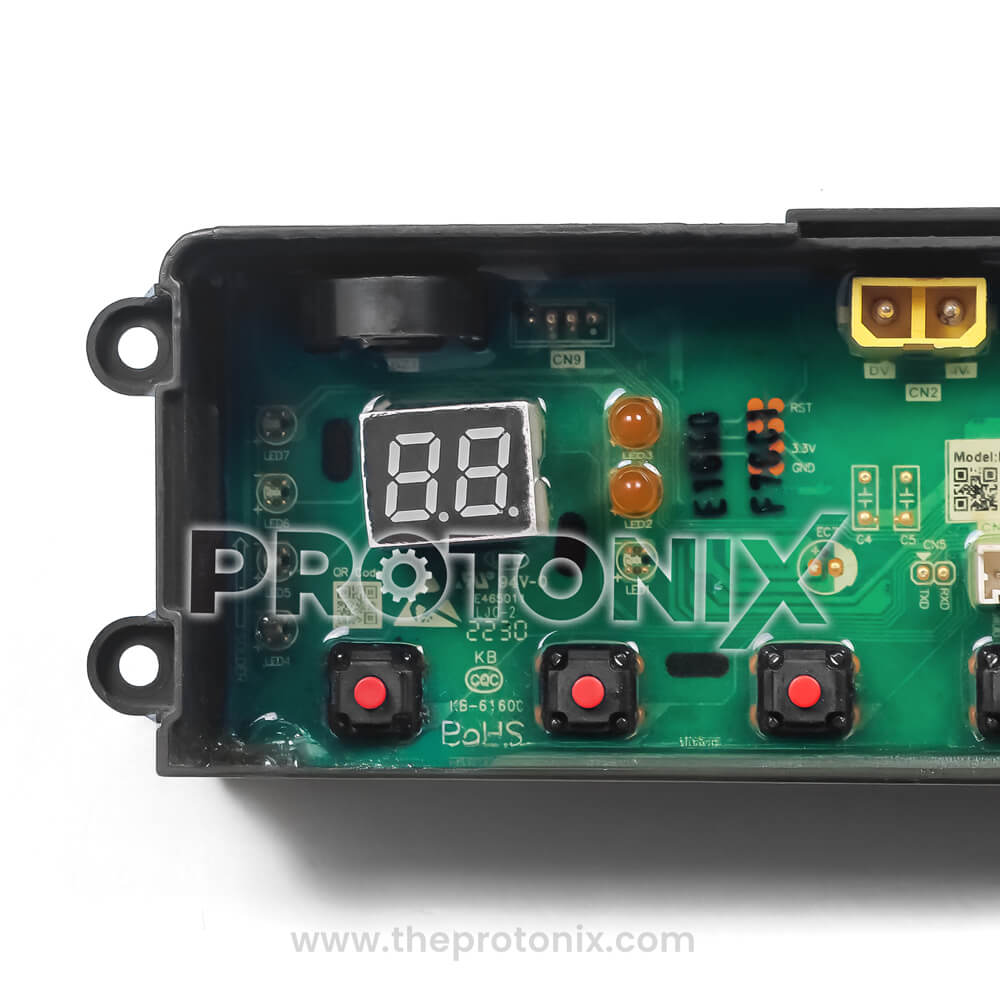 Close-up of Panasonic top-load 4-button PCB focused on display and buttons